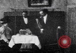 Image of couple perform magic tricks United States USA, 1900, second 13 stock footage video 65675080679