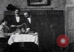 Image of couple perform magic tricks United States USA, 1900, second 53 stock footage video 65675080679