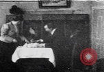 Image of couple perform magic tricks United States USA, 1900, second 58 stock footage video 65675080679