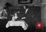 Image of couple perform magic tricks United States USA, 1900, second 59 stock footage video 65675080679