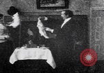 Image of couple perform magic tricks United States USA, 1900, second 60 stock footage video 65675080679