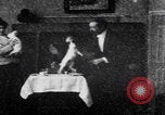 Image of couple perform magic tricks United States USA, 1900, second 62 stock footage video 65675080679