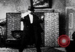 Image of magician performs tricks United States USA, 1899, second 16 stock footage video 65675080681