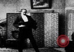 Image of magician performs tricks United States USA, 1899, second 28 stock footage video 65675080681