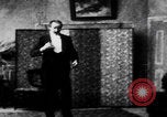 Image of magician performs tricks United States USA, 1899, second 32 stock footage video 65675080681