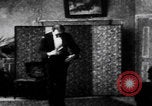 Image of magician performs tricks United States USA, 1899, second 37 stock footage video 65675080681