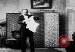 Image of magician performs tricks United States USA, 1899, second 42 stock footage video 65675080681