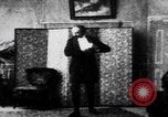 Image of magician performs tricks United States USA, 1899, second 52 stock footage video 65675080681