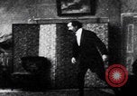 Image of magician performs tricks United States USA, 1899, second 55 stock footage video 65675080681