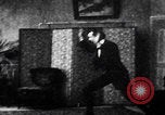 Image of magician performs tricks United States USA, 1899, second 56 stock footage video 65675080681