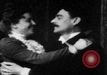 Image of affectionate couple United States USA, 1900, second 26 stock footage video 65675080682