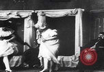 Image of women in paintings United States USA, 1900, second 8 stock footage video 65675080683