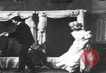 Image of women in paintings United States USA, 1900, second 21 stock footage video 65675080683