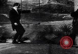 Image of magician performs magic United States USA, 1900, second 4 stock footage video 65675080684
