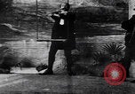 Image of magician performs magic United States USA, 1900, second 5 stock footage video 65675080684