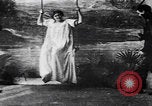 Image of magician performs magic United States USA, 1900, second 14 stock footage video 65675080684