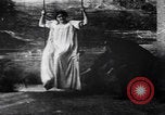 Image of magician performs magic United States USA, 1900, second 15 stock footage video 65675080684