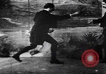 Image of magician performs magic United States USA, 1900, second 42 stock footage video 65675080684