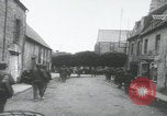 Image of US Army enter Normandy village France, 1944, second 4 stock footage video 65675080711
