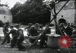Image of US Army enter Normandy village France, 1944, second 16 stock footage video 65675080711