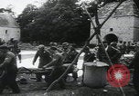 Image of US Army enter Normandy village France, 1944, second 17 stock footage video 65675080711