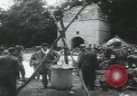 Image of US Army enter Normandy village France, 1944, second 19 stock footage video 65675080711
