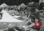 Image of US Army enter Normandy village France, 1944, second 27 stock footage video 65675080711