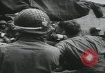 Image of US Army enter Normandy village France, 1944, second 32 stock footage video 65675080711