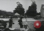 Image of US Army enter Normandy village France, 1944, second 42 stock footage video 65675080711