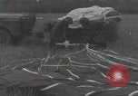 Image of C-47 airdrop  Newbury Berkshire England, 1944, second 50 stock footage video 65675080717