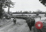 Image of German prisoners marching Saint Mere Eglise France, 1944, second 3 stock footage video 65675080722