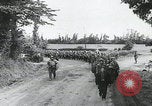 Image of German prisoners marching Saint Mere Eglise France, 1944, second 4 stock footage video 65675080722