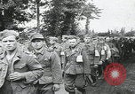 Image of German prisoners marching Saint Mere Eglise France, 1944, second 5 stock footage video 65675080722