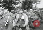 Image of German prisoners marching Saint Mere Eglise France, 1944, second 8 stock footage video 65675080722
