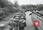 Image of German prisoners marching Saint Mere Eglise France, 1944, second 13 stock footage video 65675080722