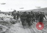 Image of German prisoners marching Saint Mere Eglise France, 1944, second 15 stock footage video 65675080722