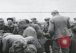 Image of German prisoners marching Saint Mere Eglise France, 1944, second 34 stock footage video 65675080722