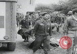Image of German prisoners carry wounded Saint Mere Eglise France, 1944, second 2 stock footage video 65675080724