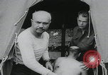 Image of German prisoners carry wounded Saint Mere Eglise France, 1944, second 13 stock footage video 65675080724