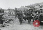 Image of German prisoners carry wounded Saint Mere Eglise France, 1944, second 16 stock footage video 65675080724