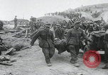Image of German prisoners carry wounded Saint Mere Eglise France, 1944, second 17 stock footage video 65675080724