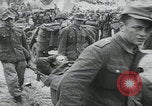 Image of German prisoners carry wounded Saint Mere Eglise France, 1944, second 21 stock footage video 65675080724