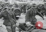 Image of German prisoners carry wounded Saint Mere Eglise France, 1944, second 22 stock footage video 65675080724