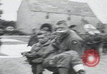 Image of German prisoners carry wounded Saint Mere Eglise France, 1944, second 23 stock footage video 65675080724