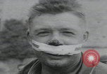 Image of German prisoners carry wounded Saint Mere Eglise France, 1944, second 30 stock footage video 65675080724
