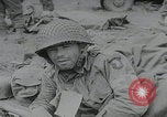 Image of German prisoners carry wounded Saint Mere Eglise France, 1944, second 38 stock footage video 65675080724