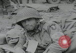 Image of German prisoners carry wounded Saint Mere Eglise France, 1944, second 40 stock footage video 65675080724