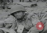 Image of German prisoners carry wounded Saint Mere Eglise France, 1944, second 41 stock footage video 65675080724