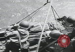 Image of German prisoners carry wounded Saint Mere Eglise France, 1944, second 51 stock footage video 65675080724