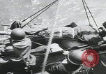 Image of German prisoners carry wounded Saint Mere Eglise France, 1944, second 52 stock footage video 65675080724
